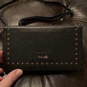 Brand new 100% leather “the Sak” wristlet/wallet/purse.